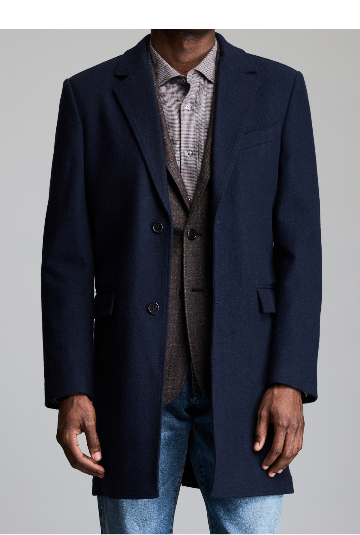 Model shows the fit of the coat.