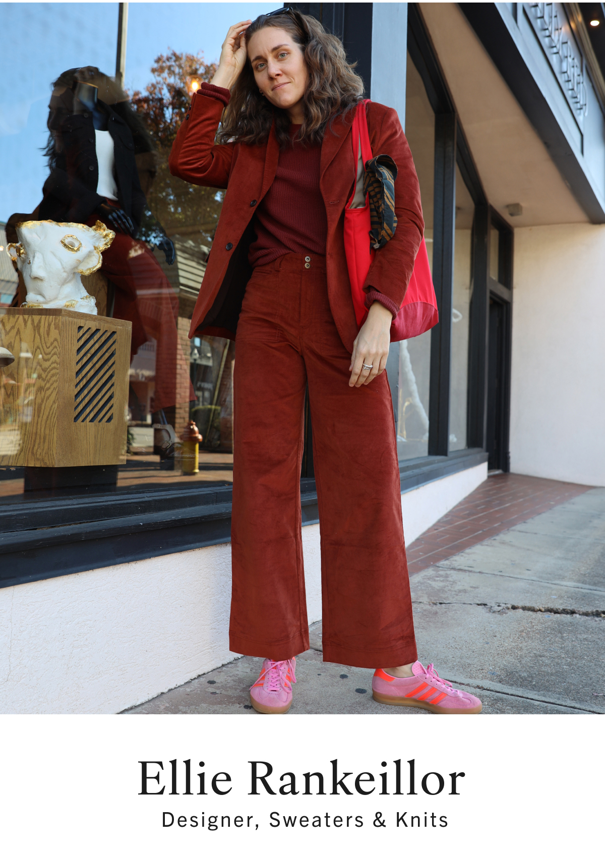 Ellie Rankeillor, Designer, Sweaters & Knits, wears a red velvet twill blazer and matching pant, with a matching sweater underneath for a monochrome look.