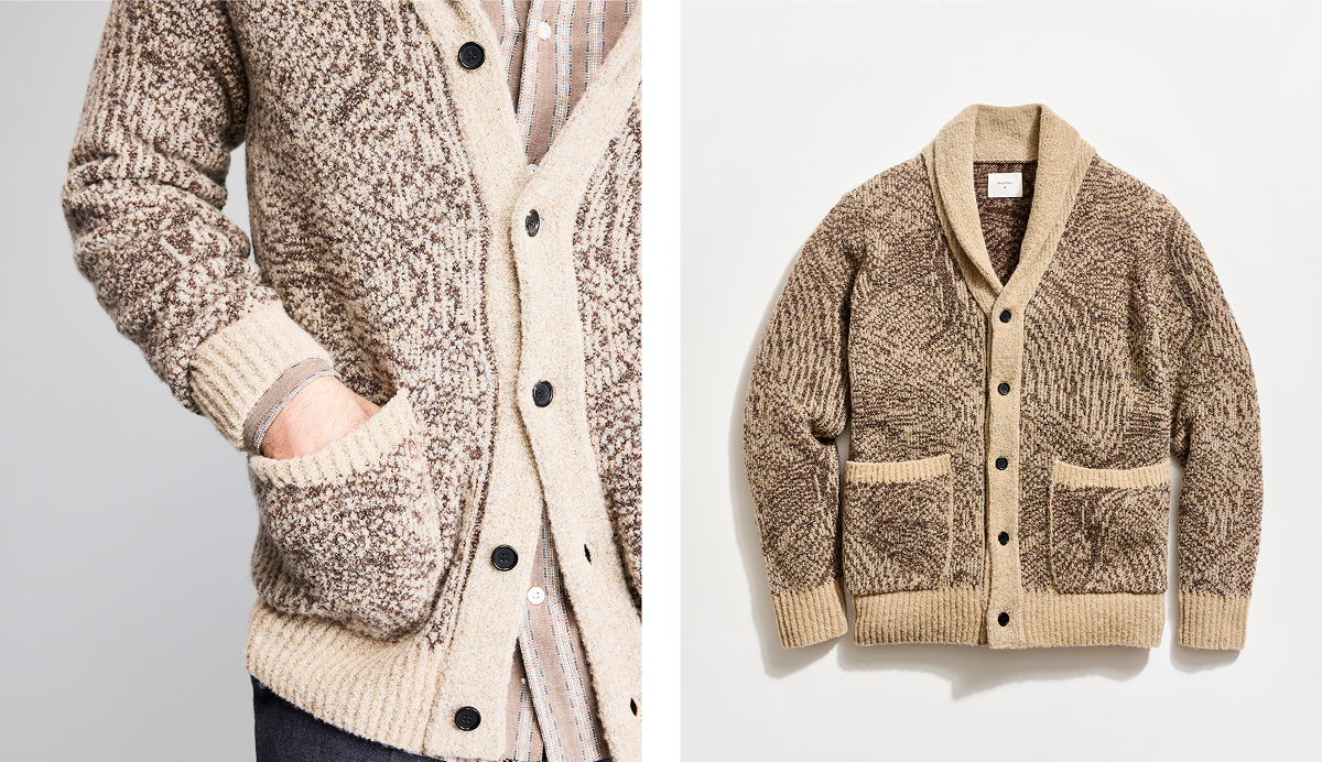A beige cardigan with dark brown flow pattern.