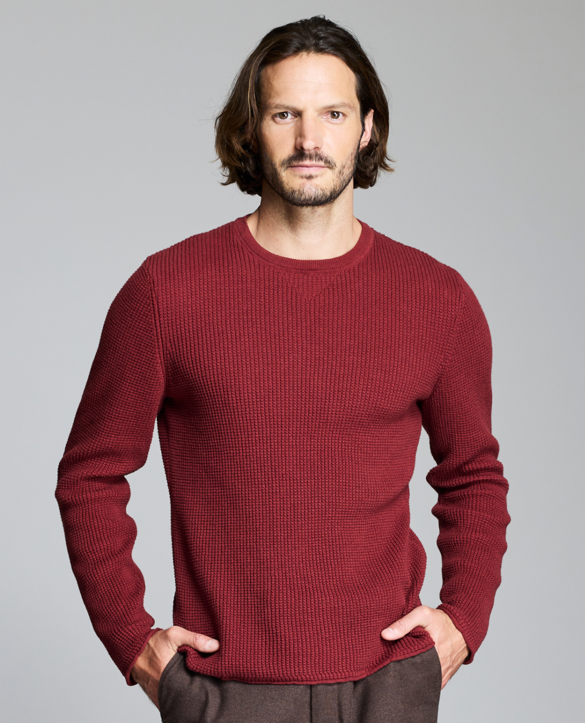 Model wears the Mini Waffle Crew in Syrah, a rich wine red.