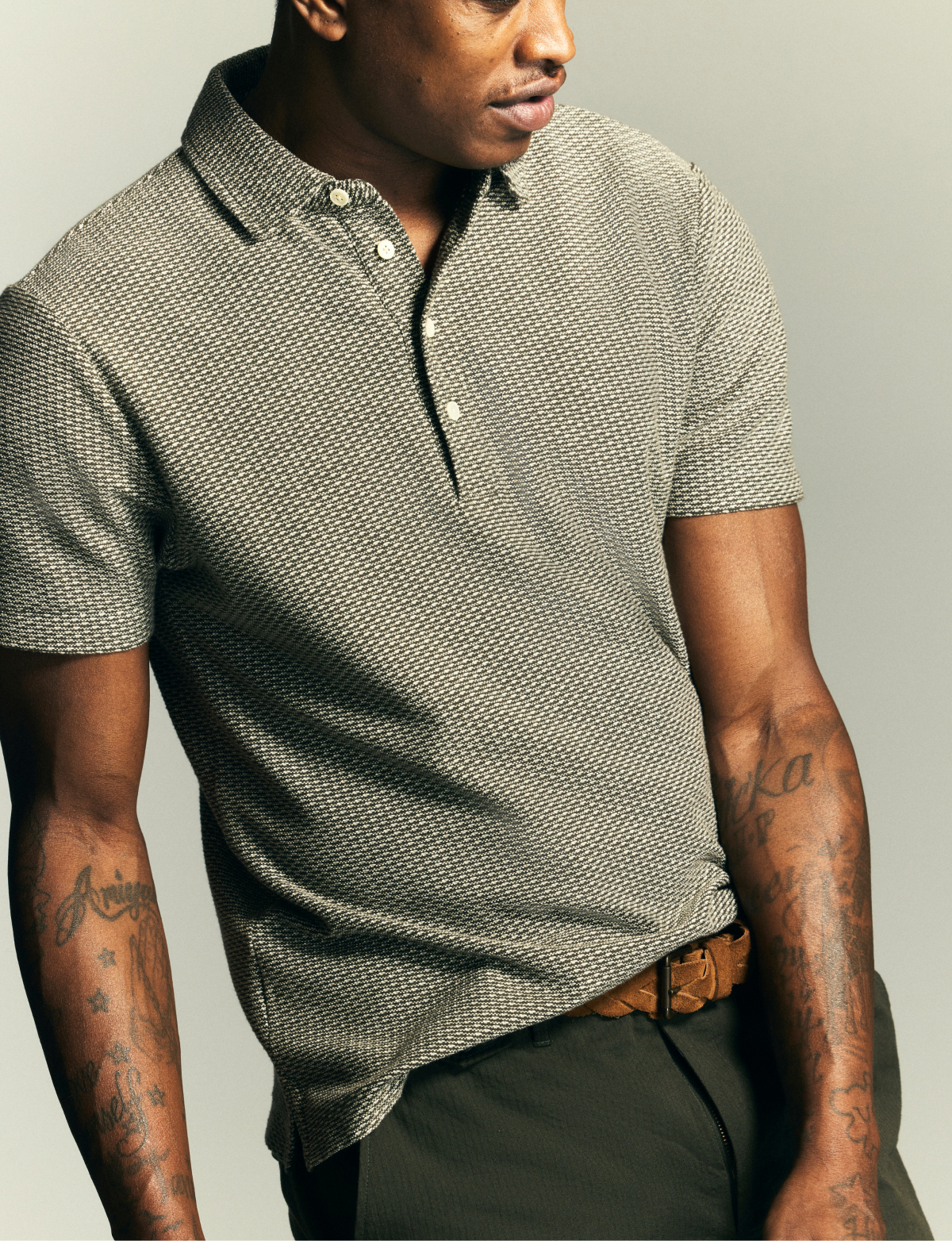 Model wears a Billy Reid polo.