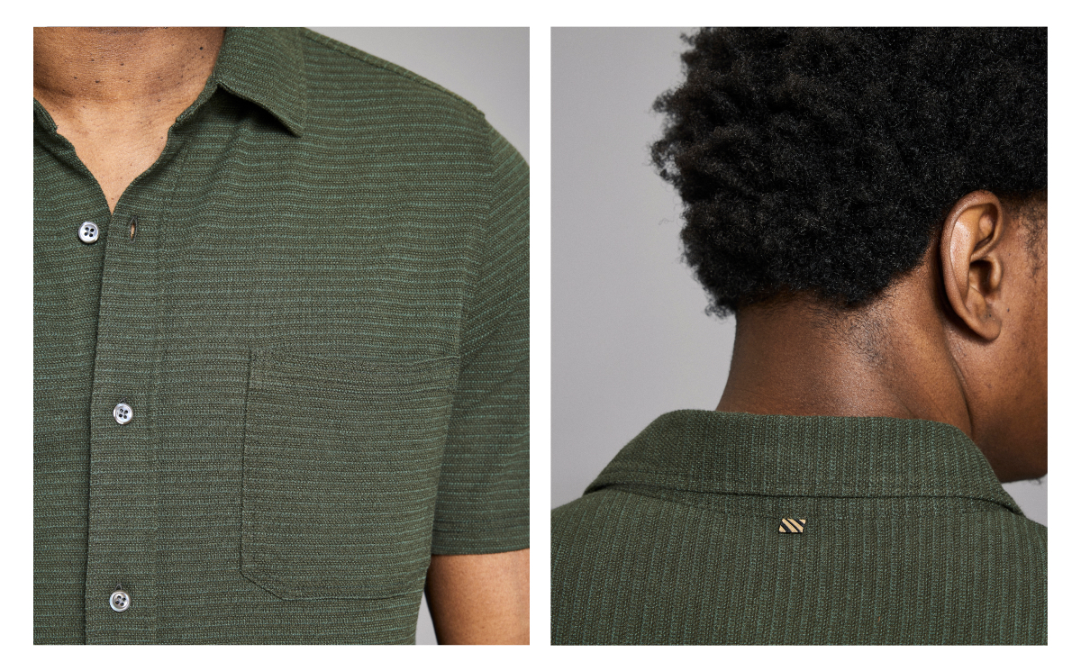 Model wears the rosin heather color of the shirt, showing the chest pocket and black and gold striped tag at the back neck.
