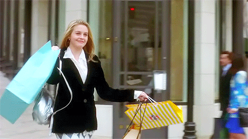 Cher Horowitz from the movie Clueless after a shopping spree