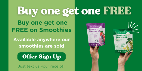 Image of one hand holding Blendtopia Immunity Smoothie next to another hand holding Blendtopia Detox Smoothie. Text reads: Buy one get one FREE. For a limited time: buy one smoothie kit get one free. Just text us your receipt. Button text reads: Offer Sign Up