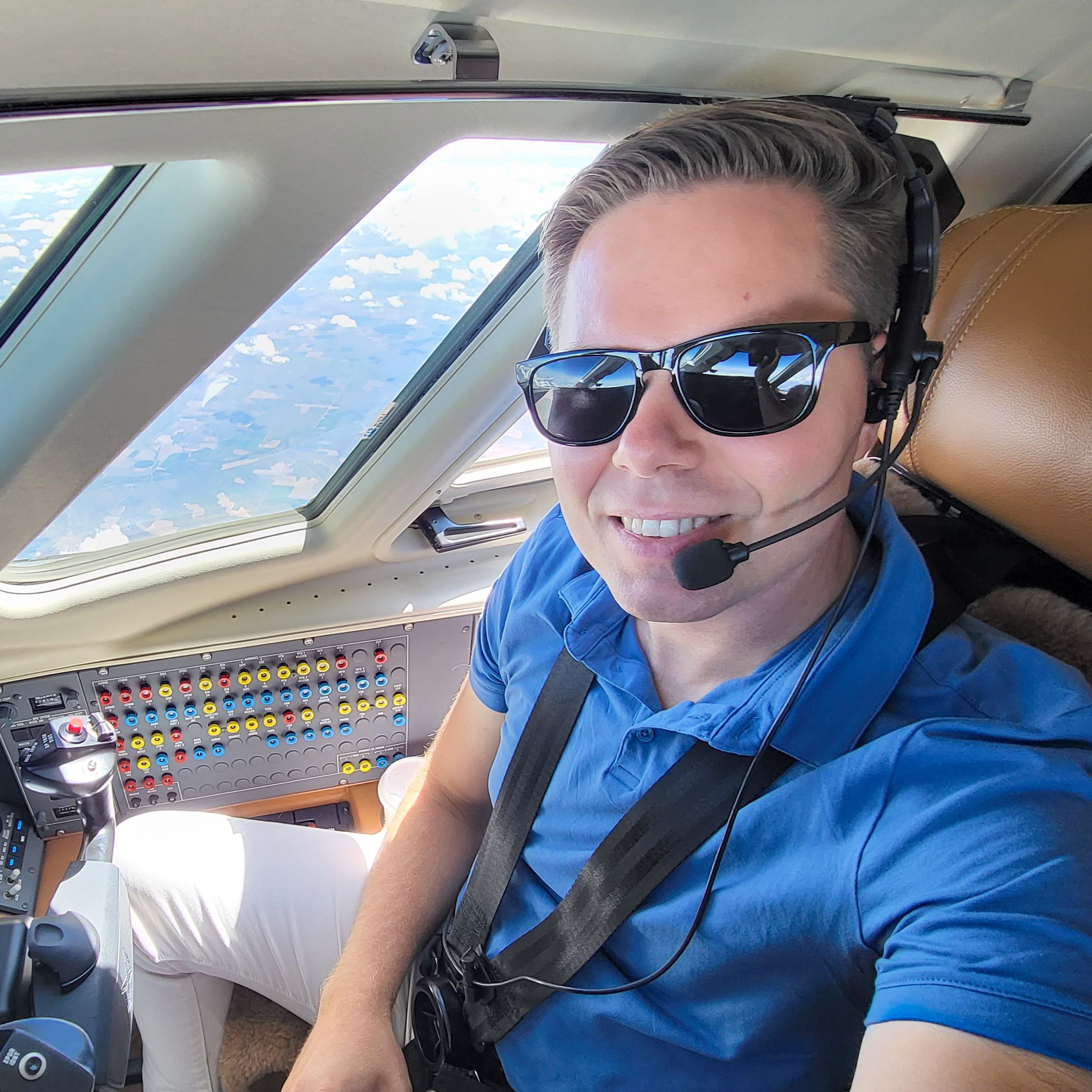 Paul in plane cockpit