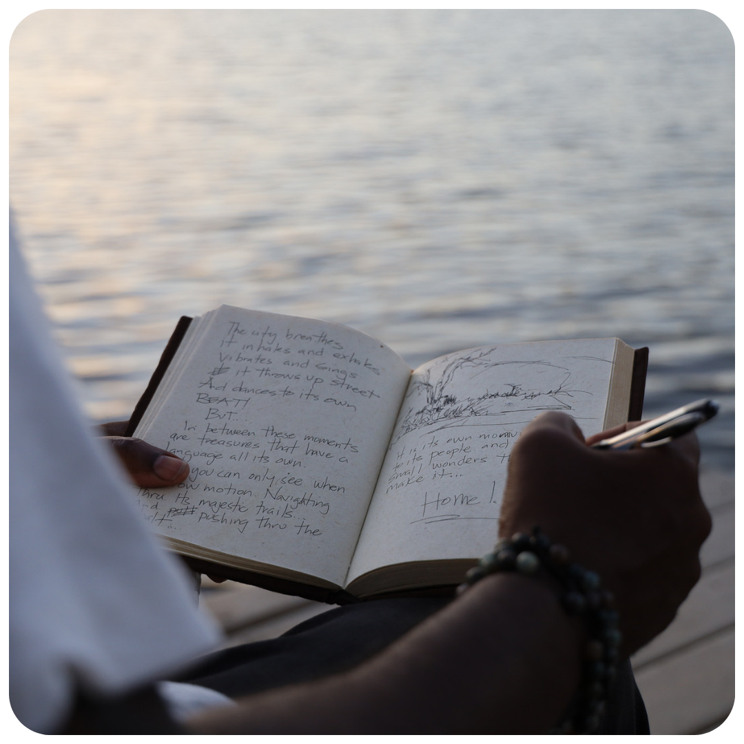 man journaling
