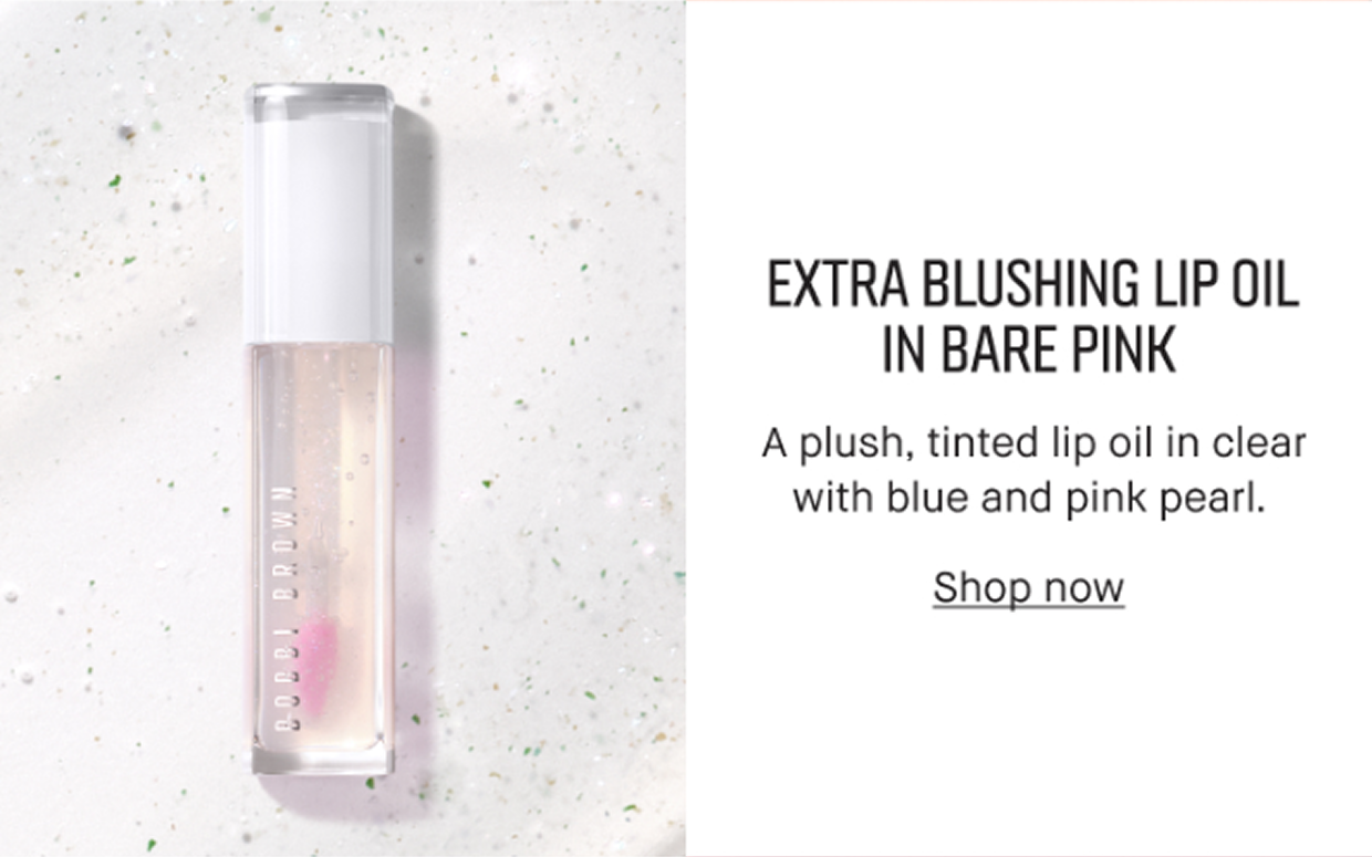 EXTRA BLUSHING LIP OIL IN BARE PINK | A plush, tinted lip oil in clear with blue and pearl. Shop now 