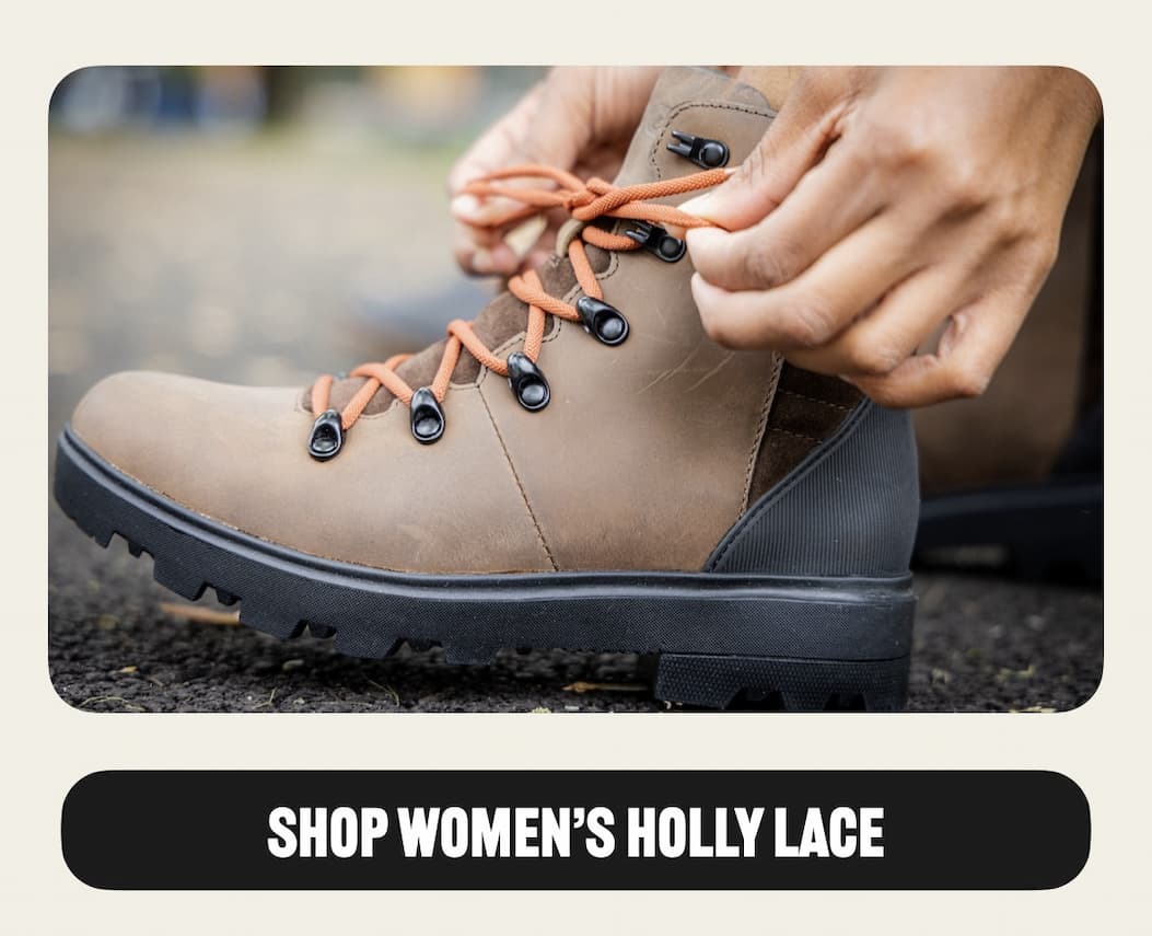 A closeup of our Women's holly lace leather boots in brown with red laces. Shop our Women's casual waterproof shoes.