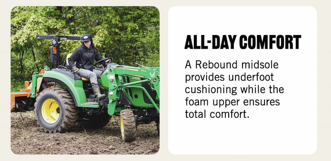 A woman driving a tractor wearing our new Classic seamless boots