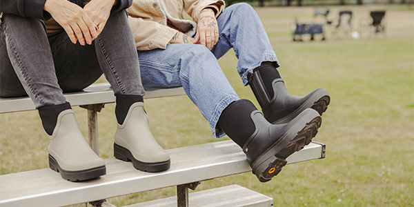 Image of two women in their hazels on a bench