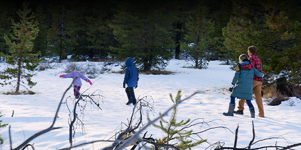 Family running in snow