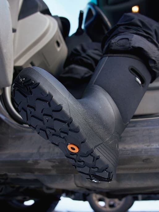 Bozeman II boot tread stepping out of a car.