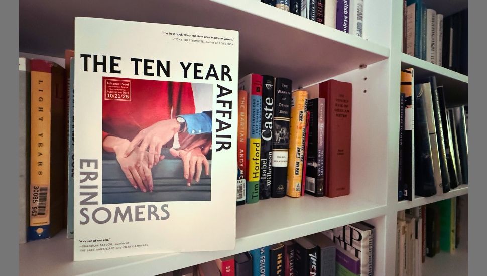 copy of The Ten Year Affair facing out on a bookshelf