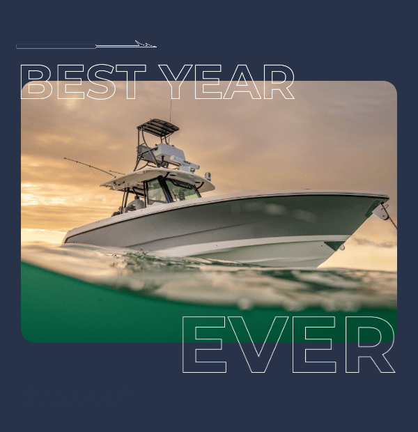 A boat shot from under water looking up the hull with text overlay saying "BEST YEAR EVER" blinking. Save up to amonut fades in.