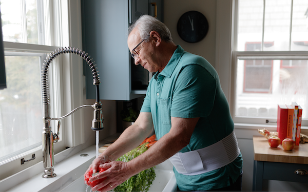Senior man wearing a BraceAbility hernia belt