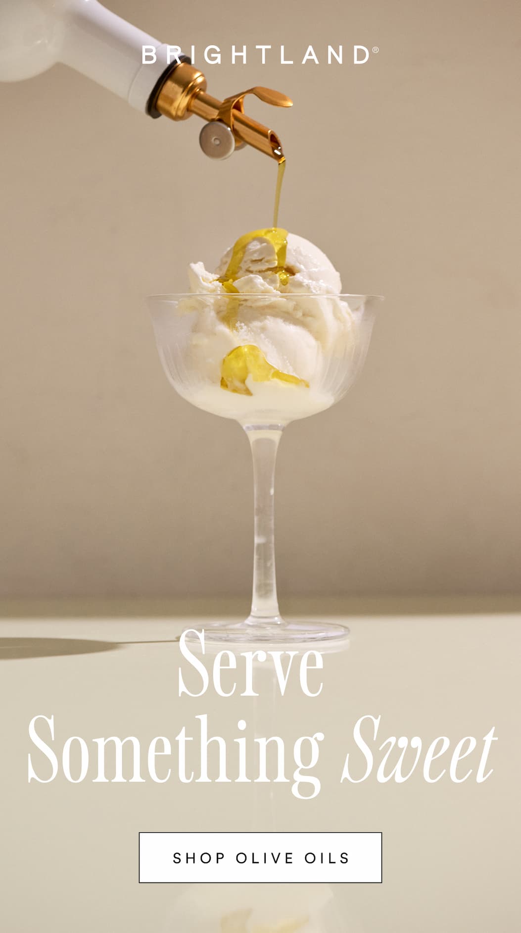 Serve Something Sweet. Shop Olive Oils. A photo of a a glass of ice cream with olive oil being drizzled on top.