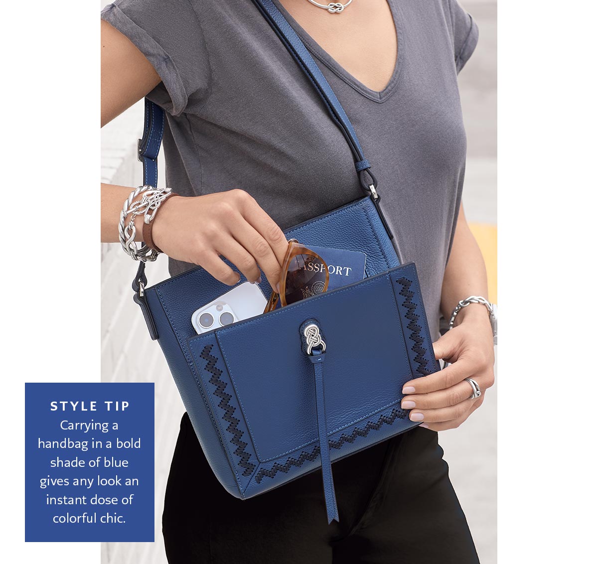 Style Tip: Carrying a handbag in a bold shade of blue gives any look an instant dose of colorful chic.