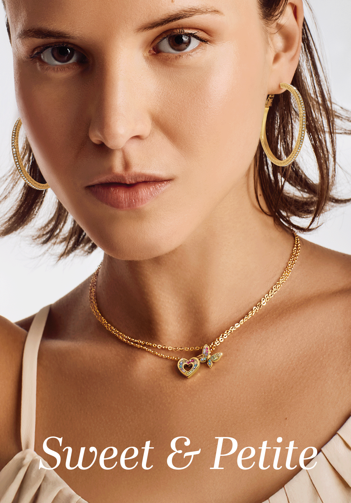 Sweet & Petite - Fall in love with one of our delicate crystal-embellished beauties, dainty and refined. Designer Catherine Hong captures the magic of butterflies, florals, and hearts to add a pop of color to your look. Perfect to wear alone or layer for a unique look. - Shop Now
