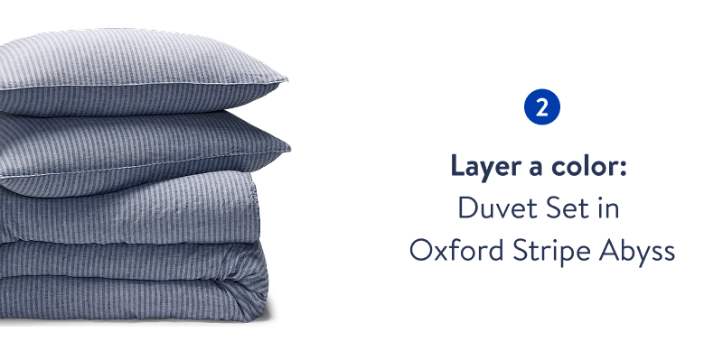 Layer a color: Duvet Set in OXford Stripe Abyss. Layer a color: Duvet Set in OXford Stripe Abyss.