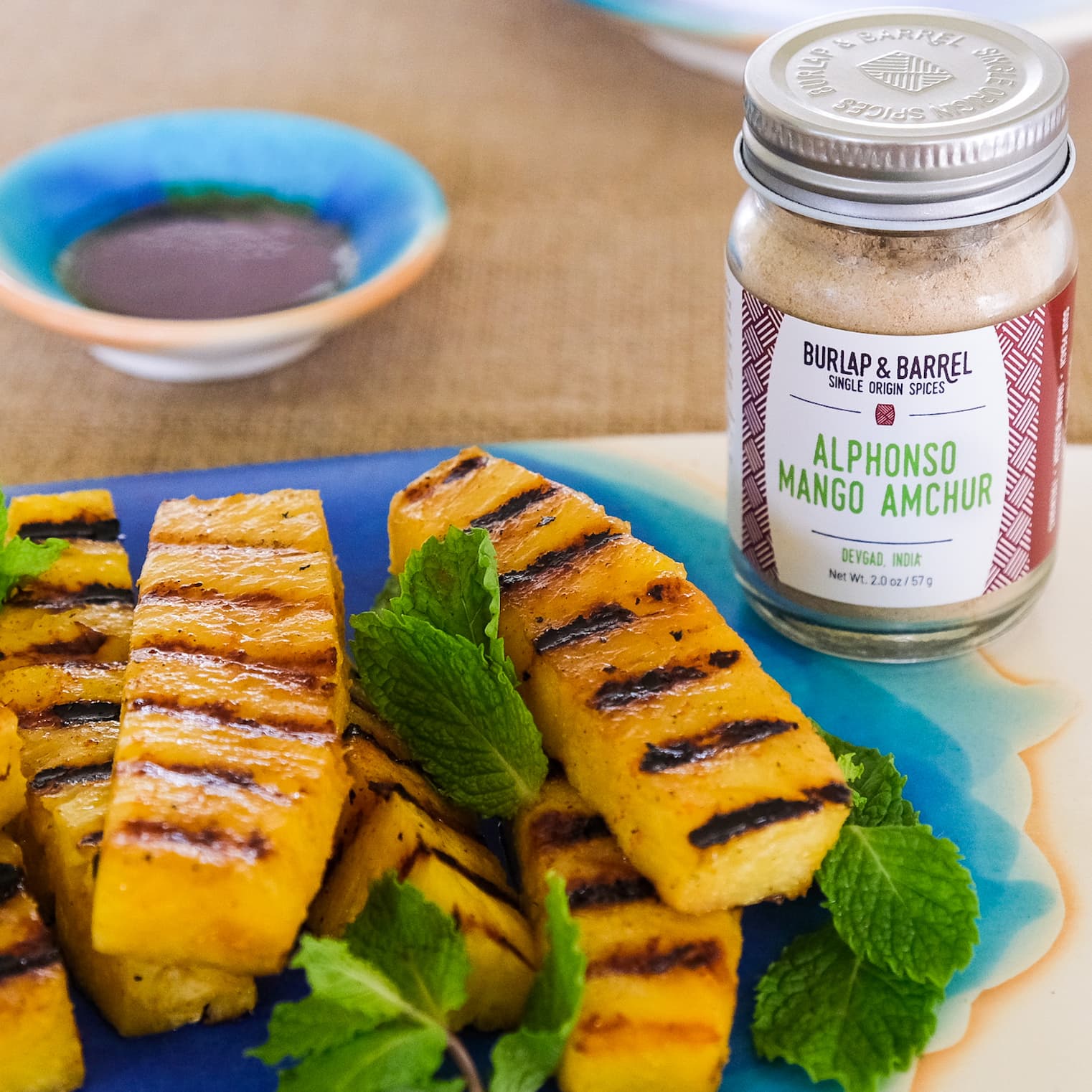 https://www.burlapandbarrel.com/blogs/recipes/grilled-pineapple-with-amchur-and-chili