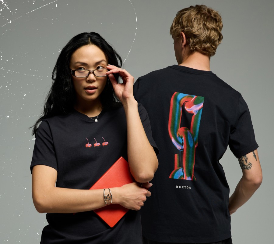 Image of a male and female model wearing the new board graphic tees.