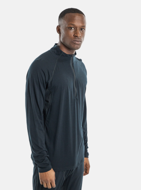 The Men's Burton Phayse Merino Base Layer Quarter-Zip in black on a model