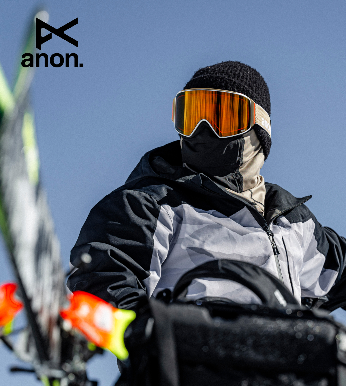 Anon M5 goggles in Black on a model in the mountains