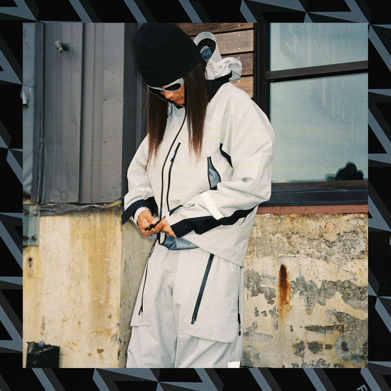 Gif showcasing the Burton x Fragment collaboration product featuring the jacket, pants, gilet, helmet and goggles.