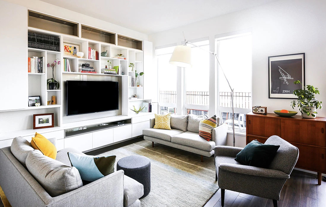 Photo of an entertainment center with an artful feature wall