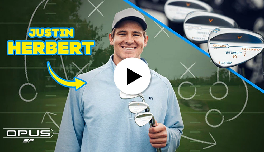 Justin Herbert holding Opus SP