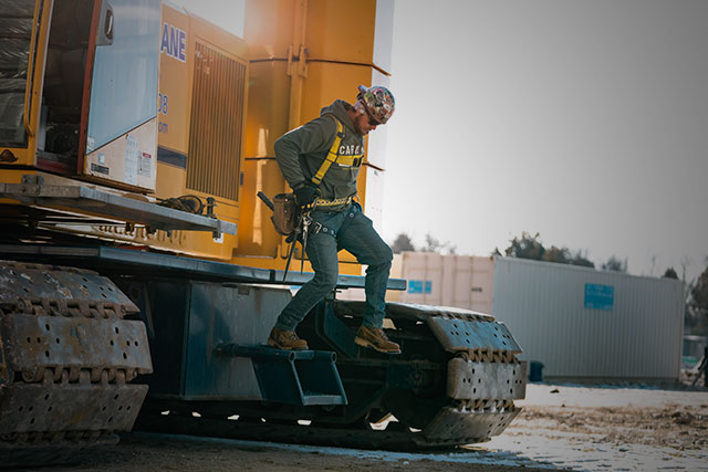A worker wearing Carolina boots and climbing down a heavy machine operated vehicle. Shop Best Sellers. 
