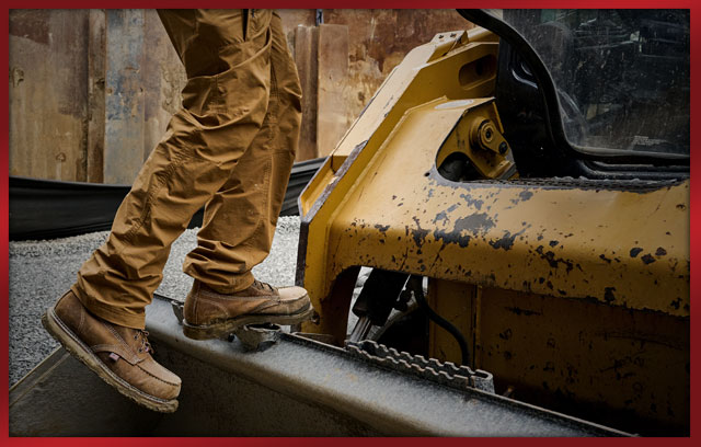 A man wearing the Amp Usa 6" Steel Toe Work Boot in brown. Shop Holiday Gift Guide.