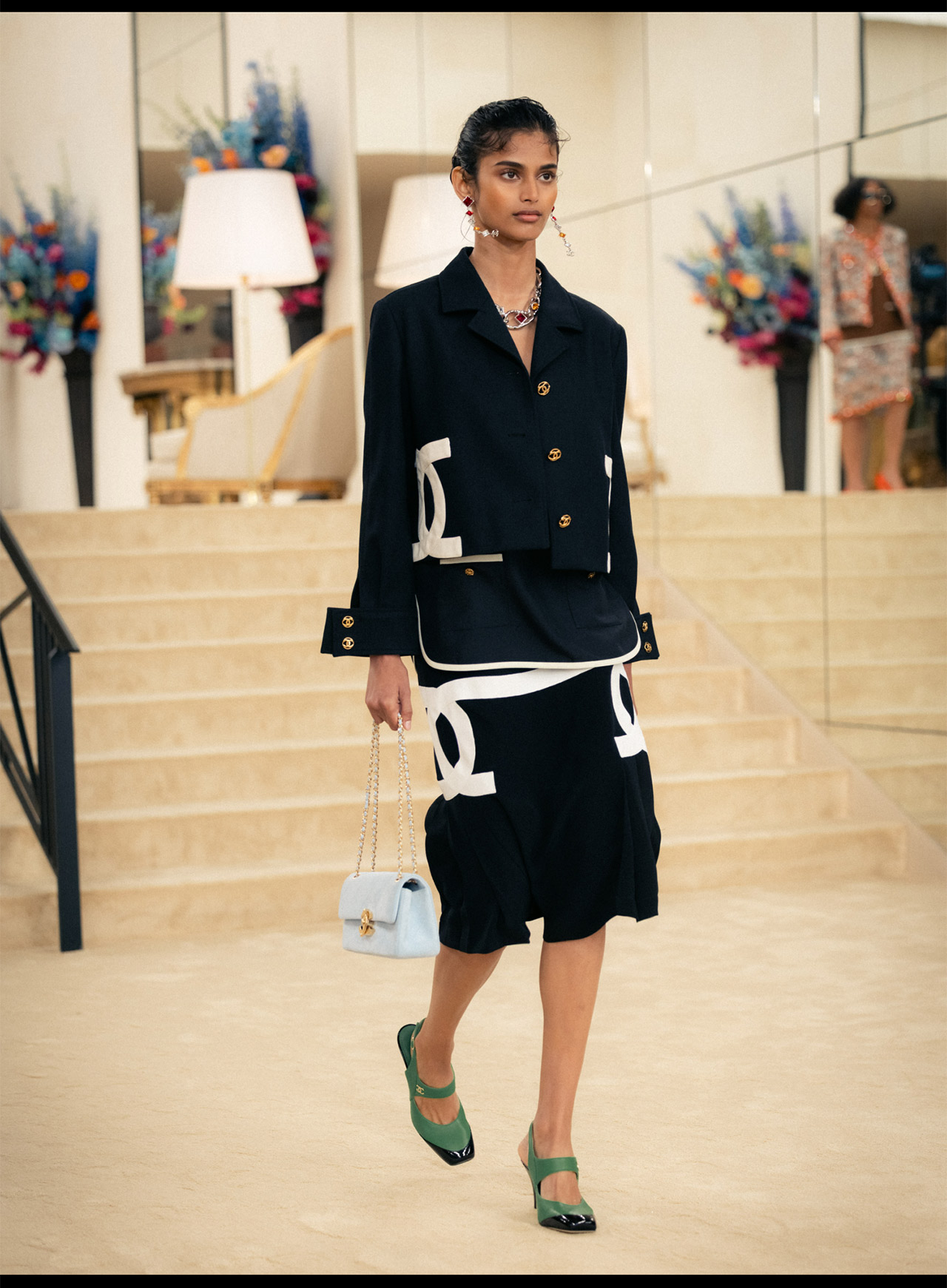 Visual showing some looks during the CHANEL Cruise 2026/27 show.