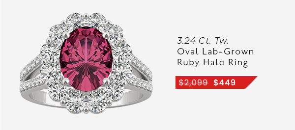 Oval Ruby Halo Ring In 14K White Gold