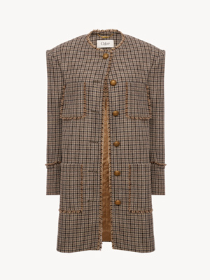 Single-breasted collarless coat in houndstooth wool