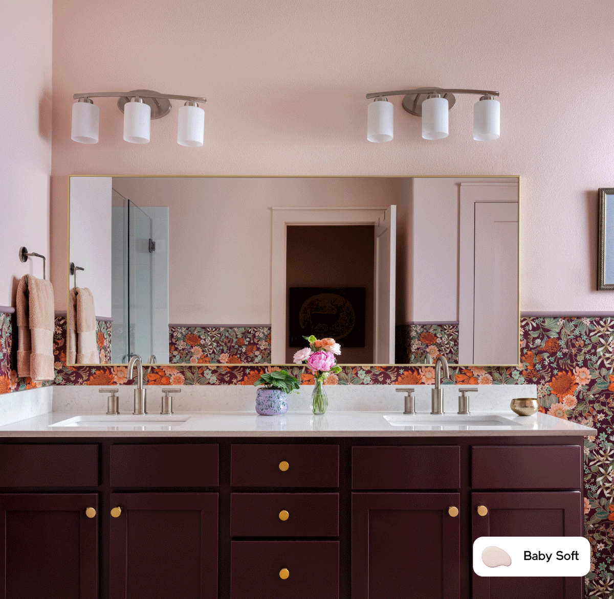 Bathroom painted in Baby Soft and kitchen featuring Nairobi Blue cabinets