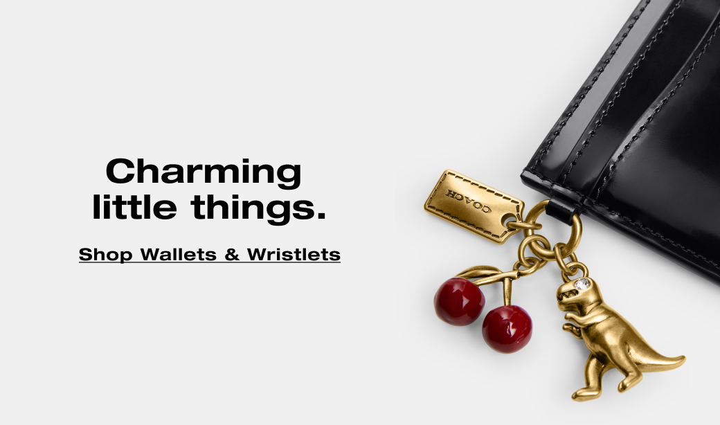 Charming little things. Shop Wallets & Wristlets