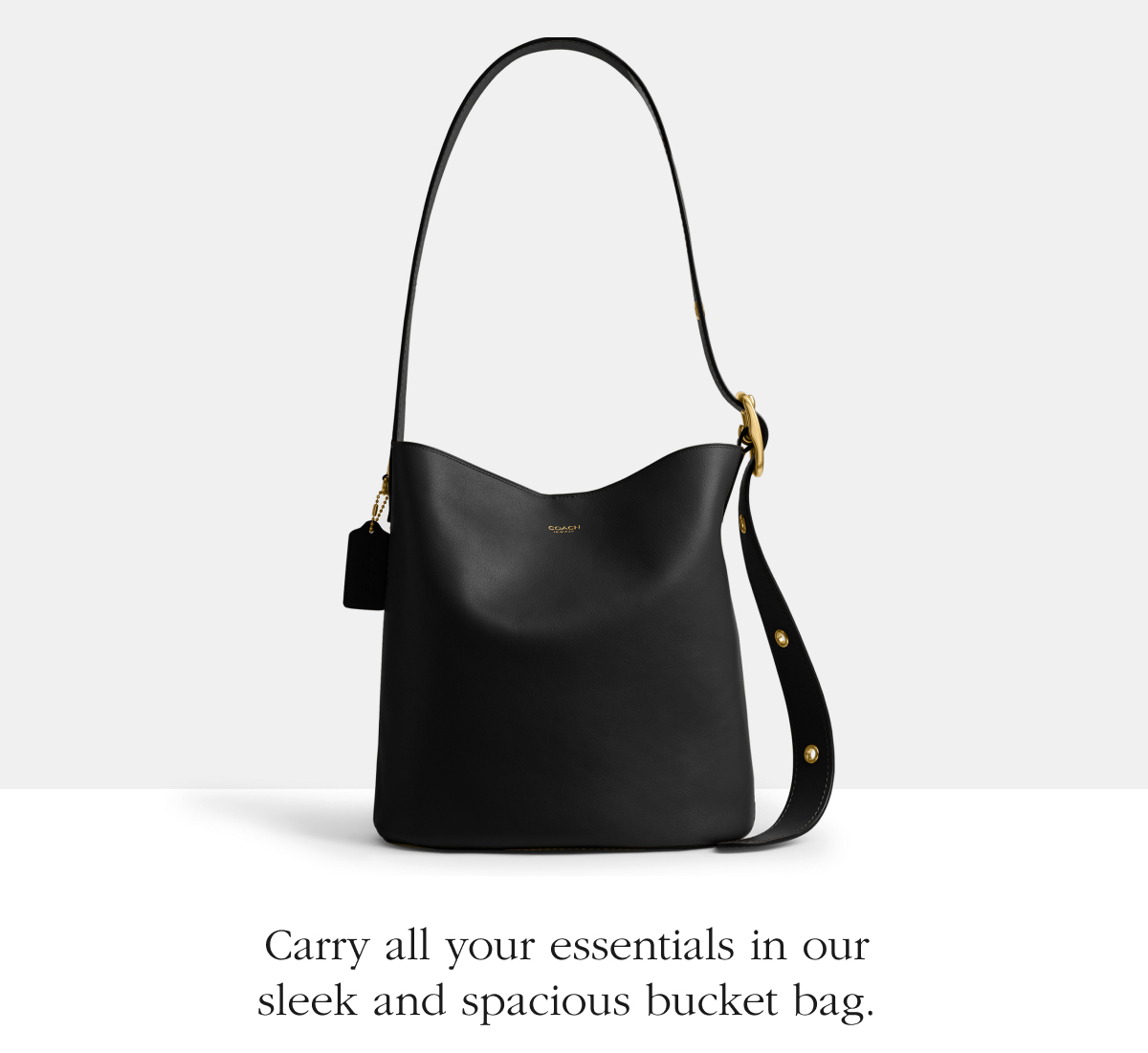 Carry all your essentials in our sleek and spacious bucket bag.