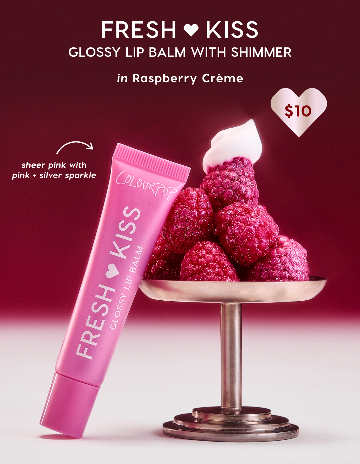 Fresh Kiss Glossy Lip Balm with Shimmer in Raspberry Creme | Sheer pink with pink + silver sparkle $10 Fresh Kiss Glossy Lip Balm with Shimmer in Raspberry Creme | Sheer pink with pink + silver sparkle $10