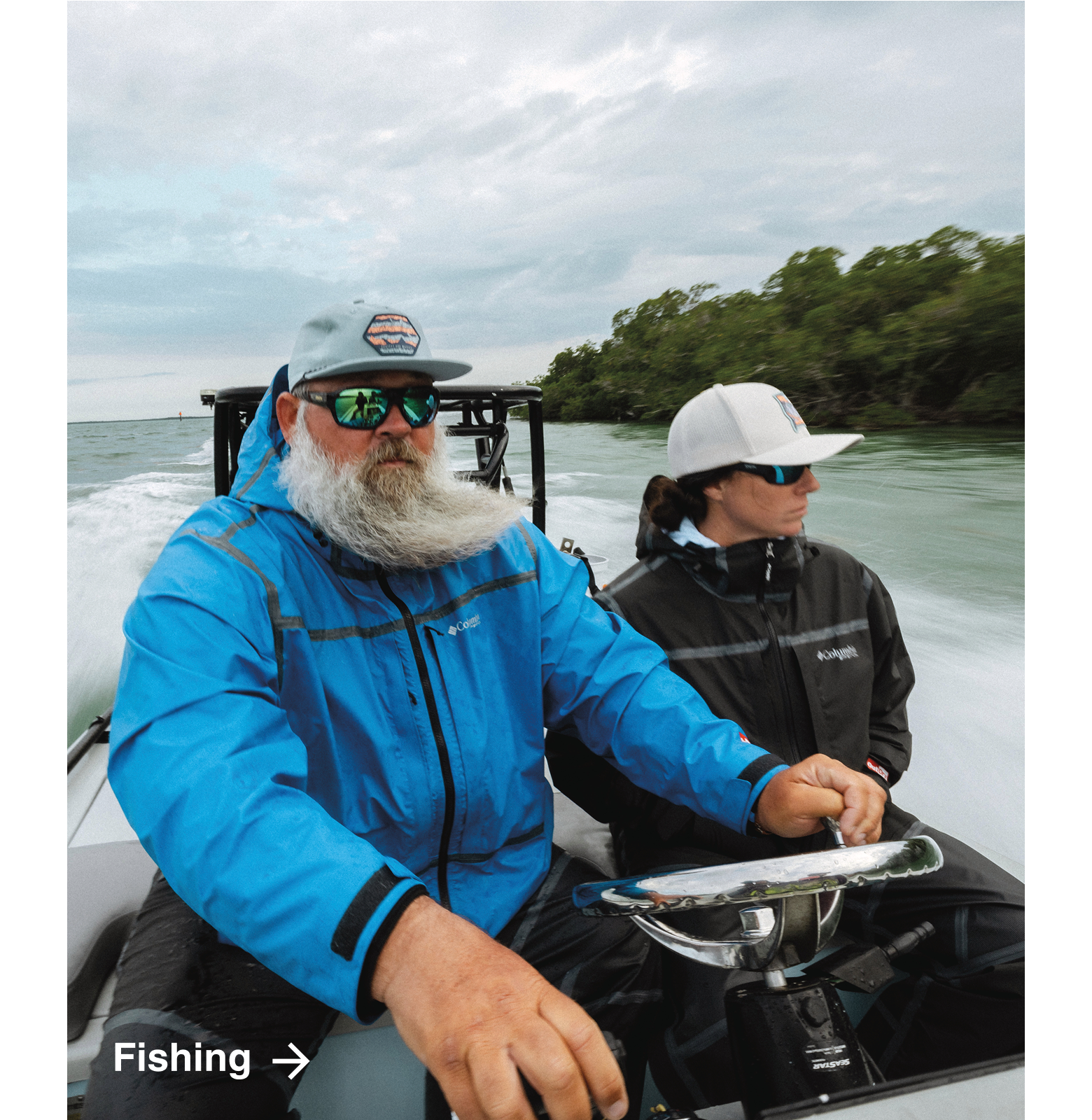 Man and woman wearing PFG on a fishing boat. 