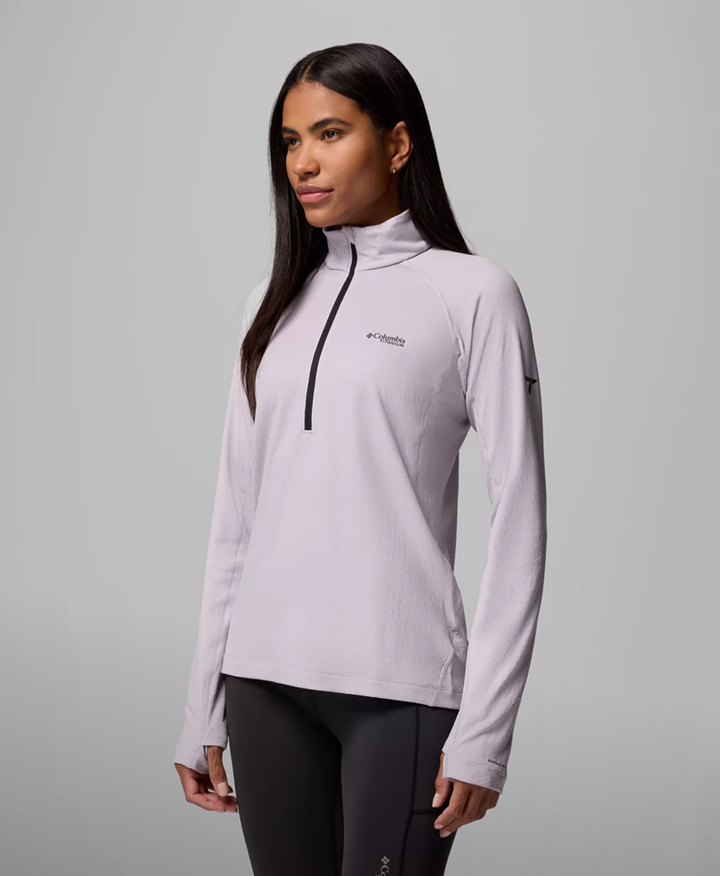 A woman in a purple mid layer