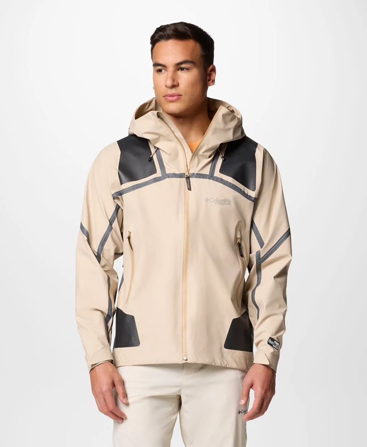 A man in a beige jacket