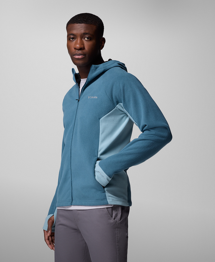 A man wearing a blue fleece jacket