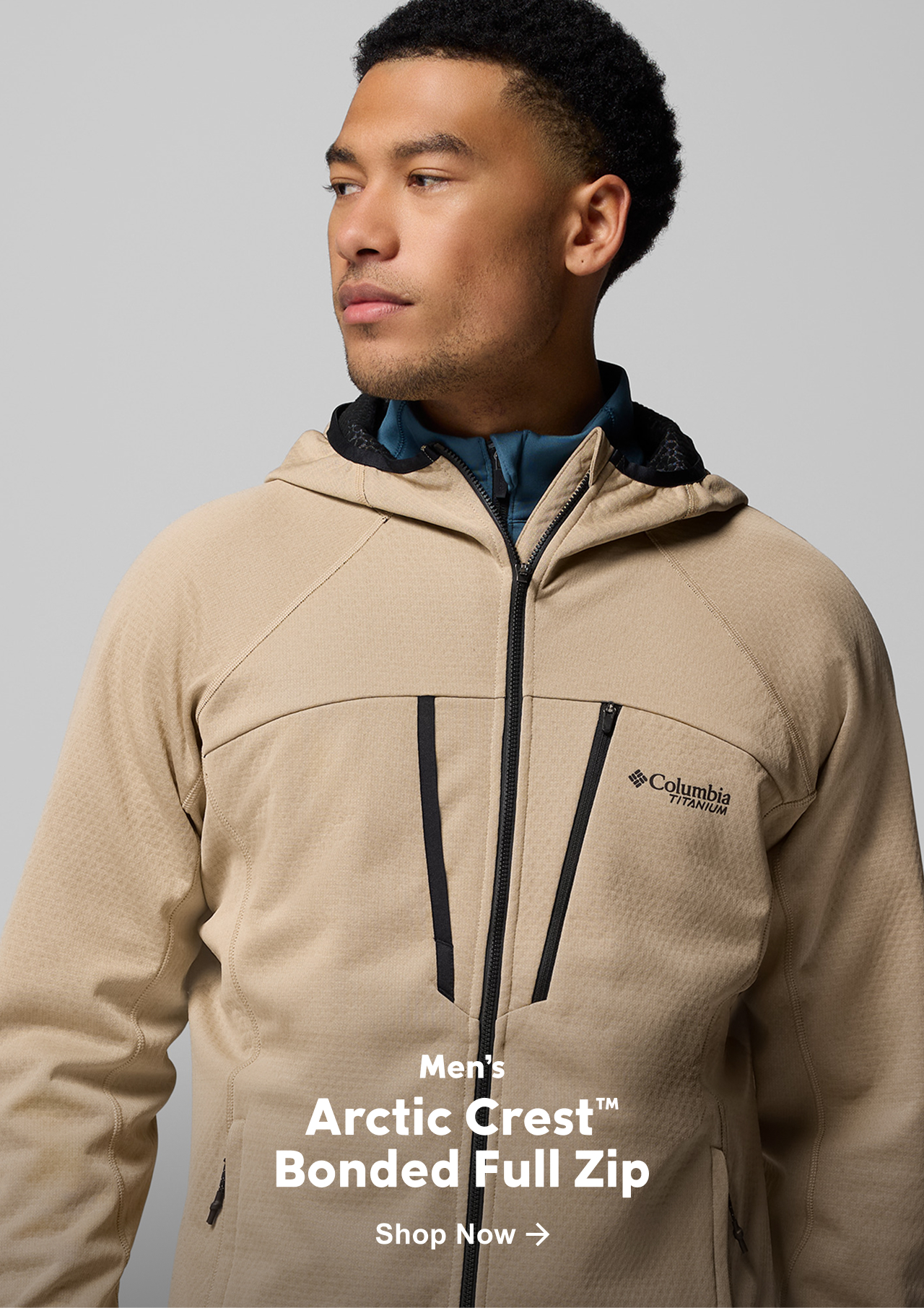A man wearing a tan jacket.