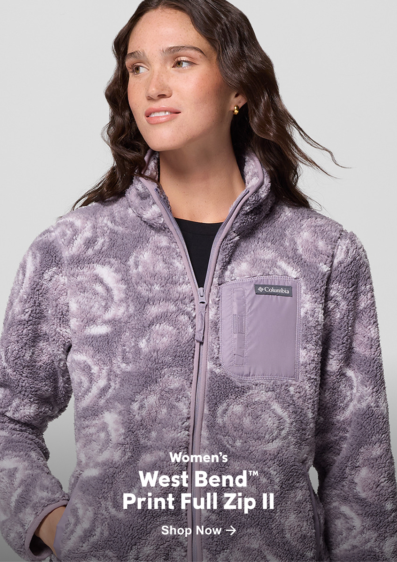 A woman wearing a purple patterned fleece