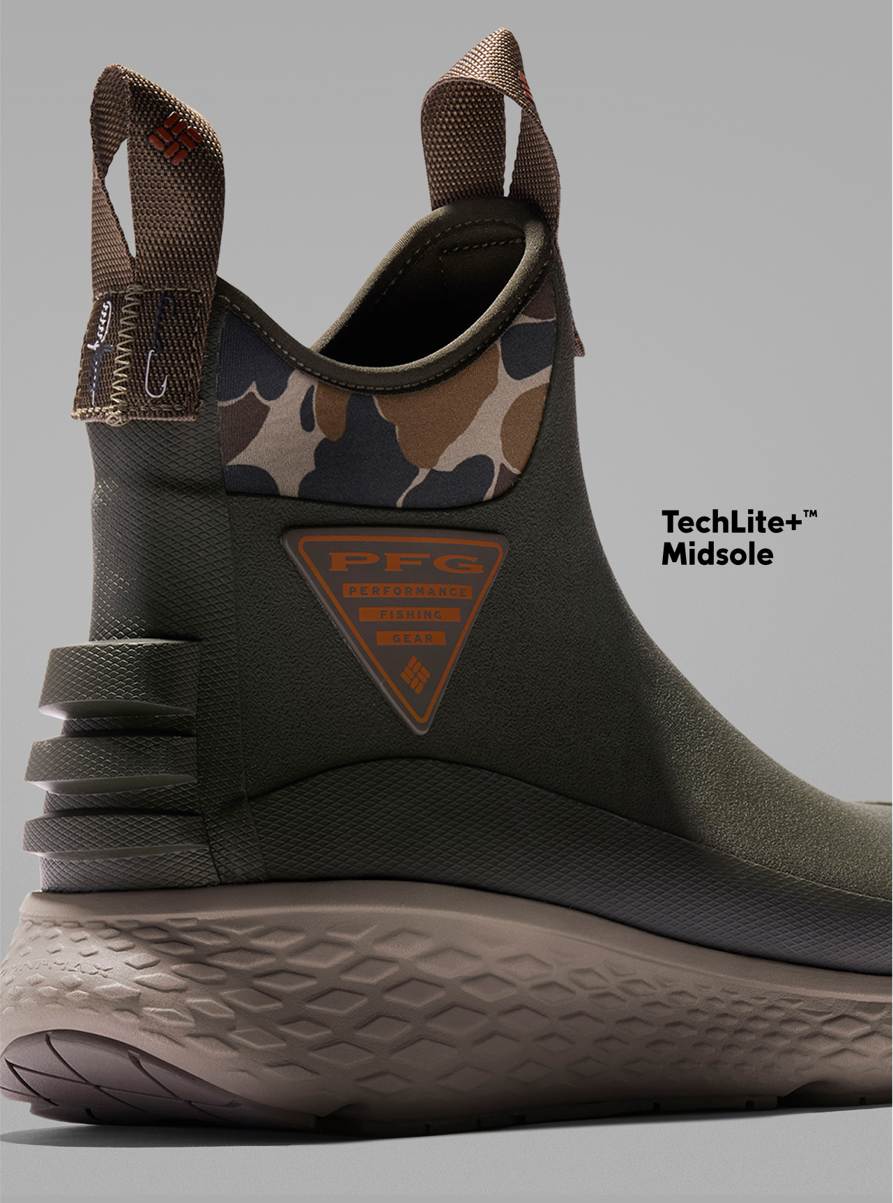 The backside of a PFG sport boot with text: TechLite+ Midsole