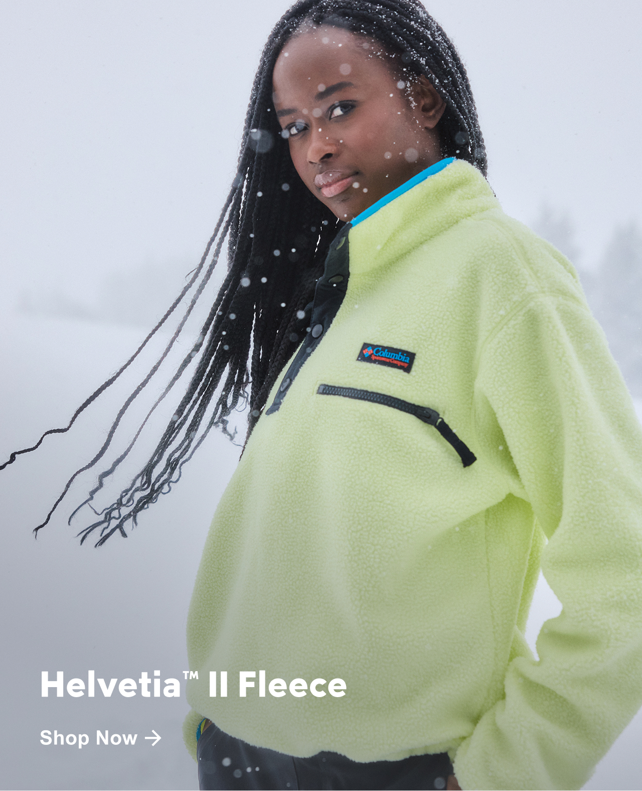 Woman in a highlighter yellow Helvetia fleece.