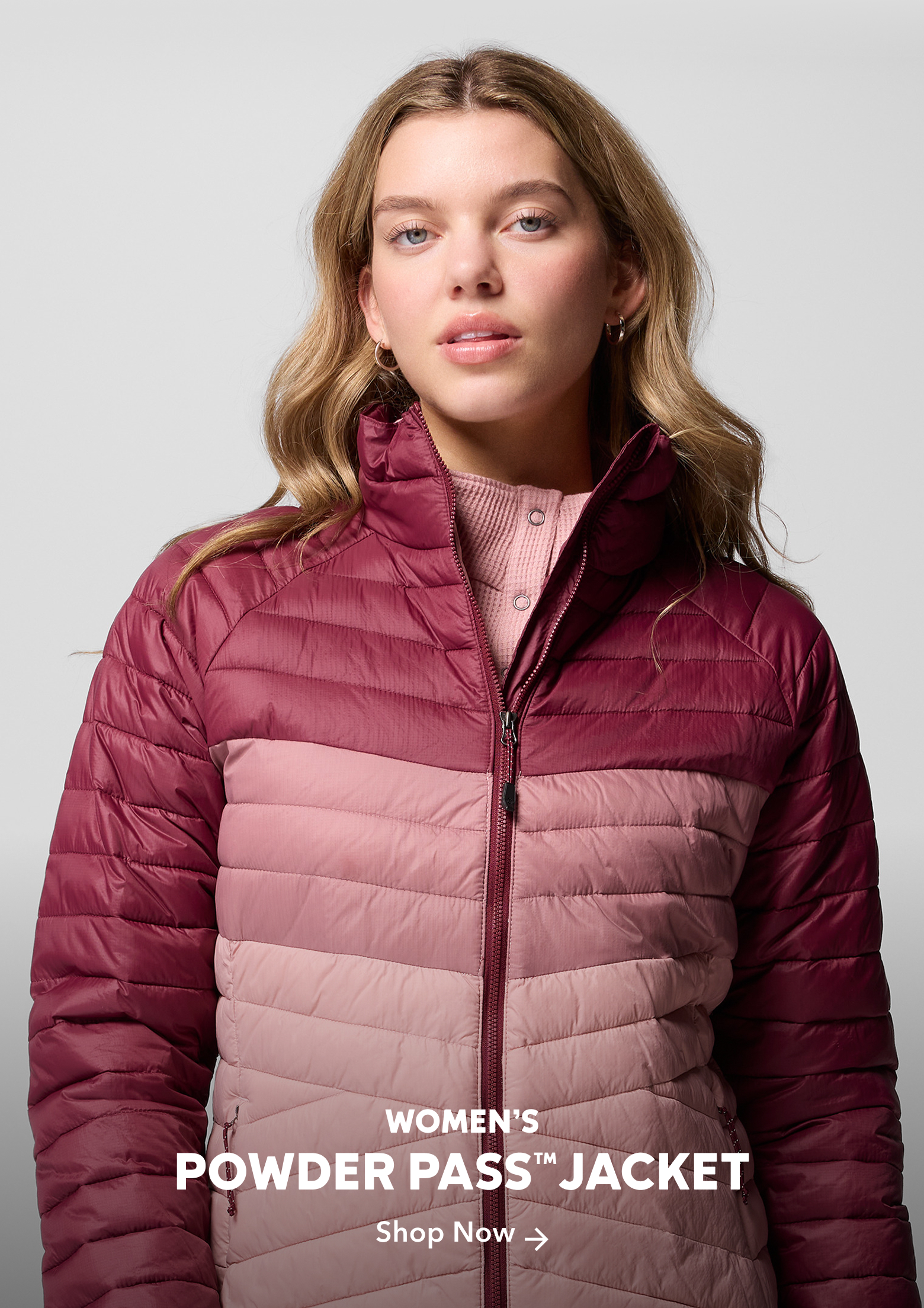 A woman wearing the Powder Pass Jacket