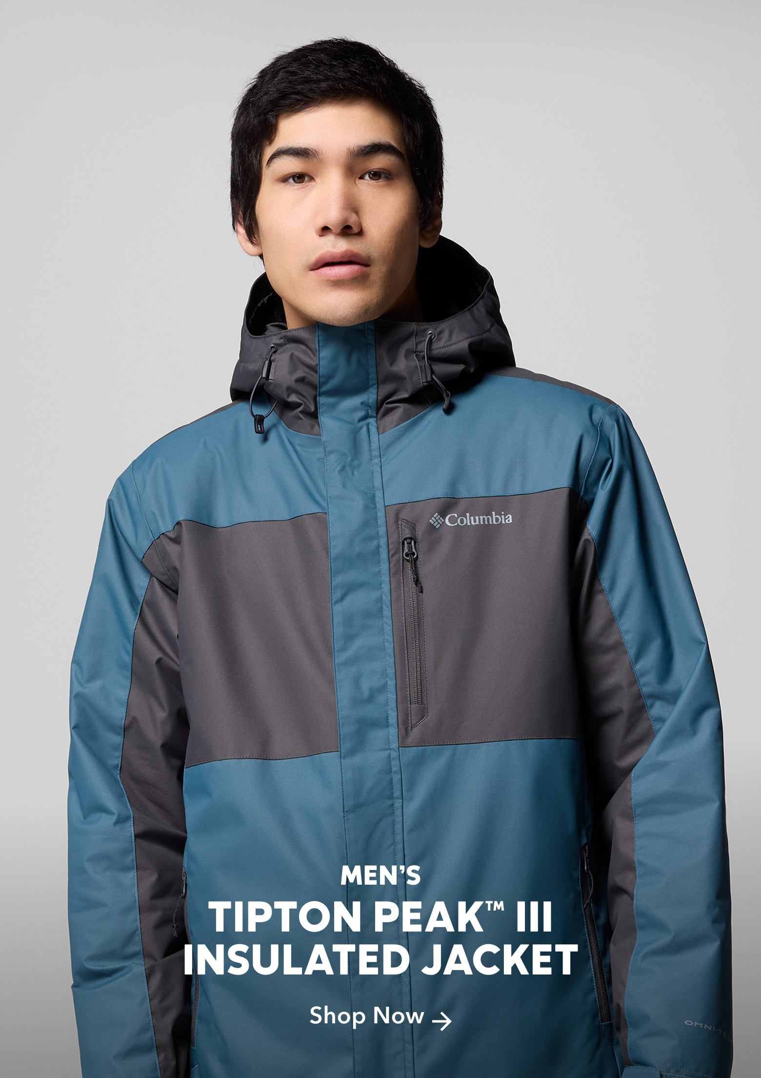 A man wearing the Tipton Peak III Jacket