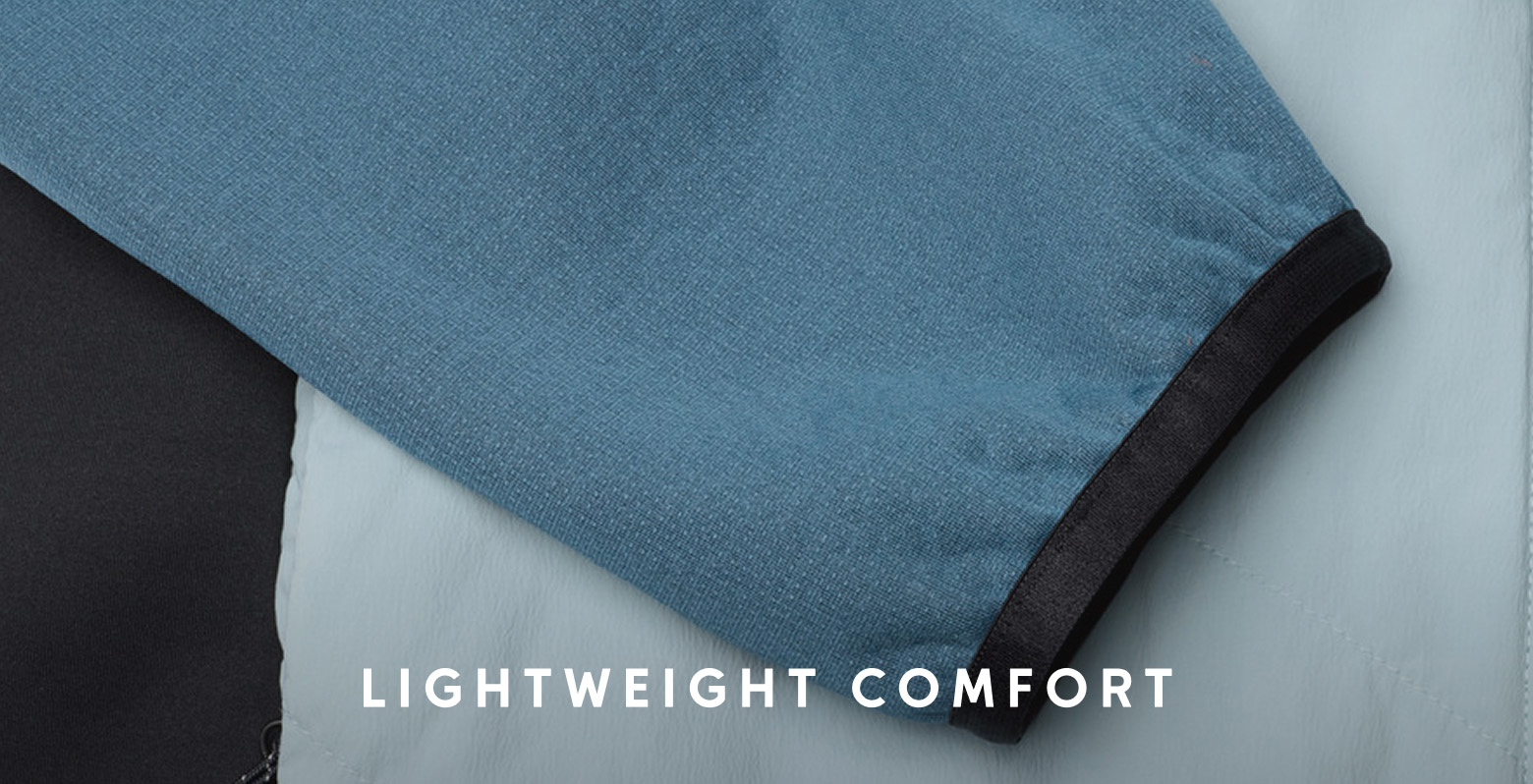 Close-up of the black liner of the jacket with text: LIGHTWEIGHT COMFORT